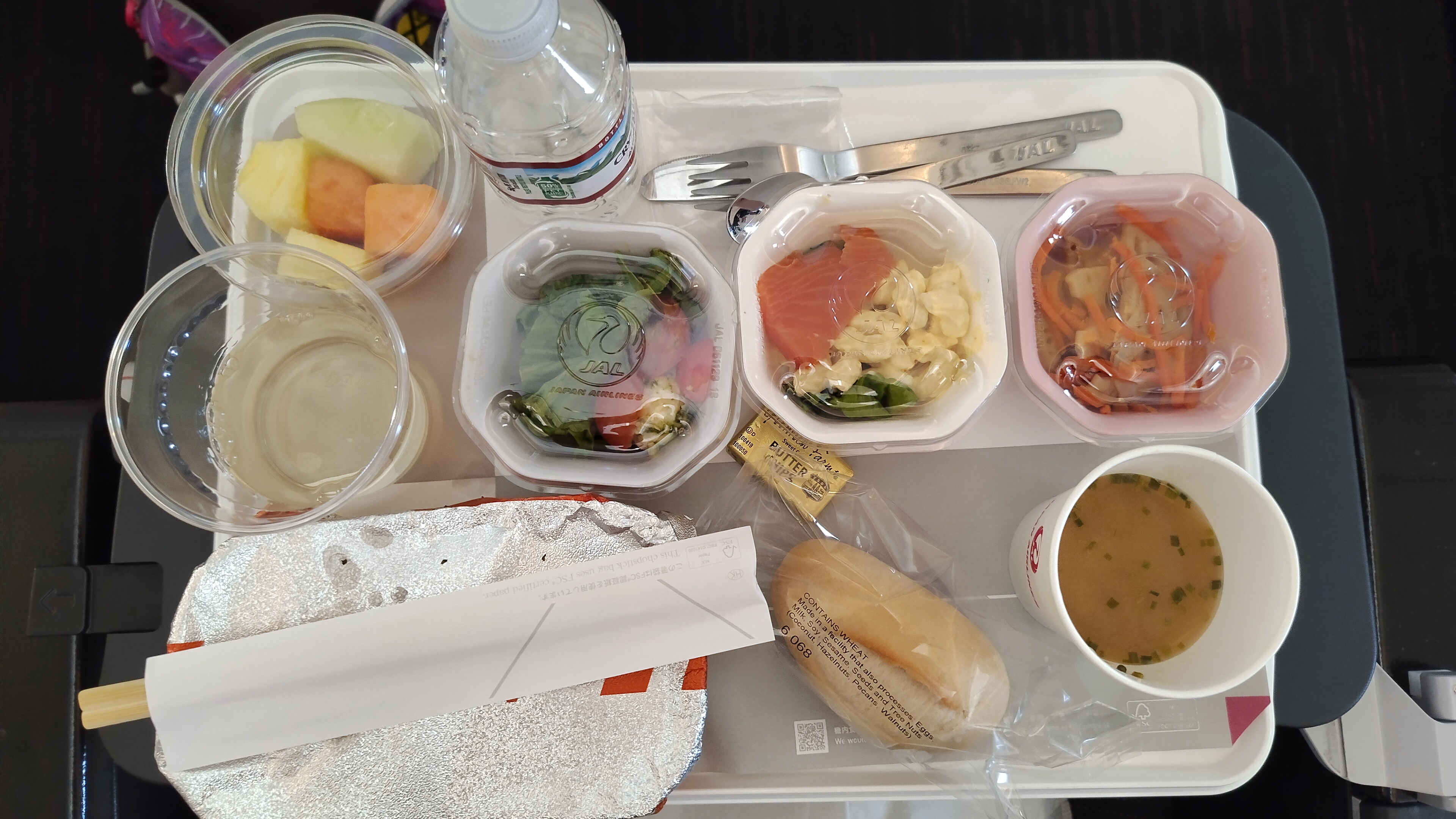 Chicken Stroganoff meal on Japan Airlines with many fixins